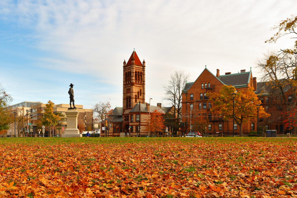 The John Bridge Monument (also known as The Puritan), in the northeast corner of the Cambridge Common in Cambridge, Massachusetts,